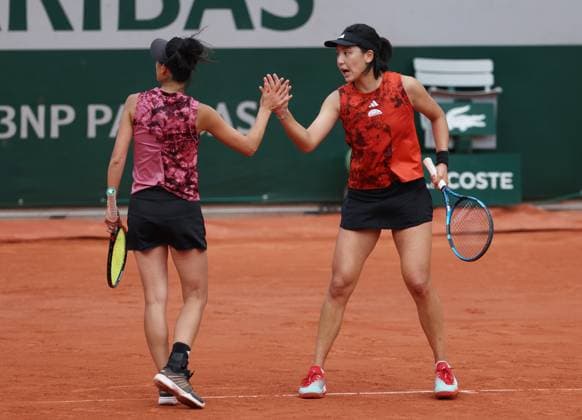 (230607) -- PARIS, June 7, 2023 -- Wang Xinyu (R) of China Hsieh Su-Wei of Chinese Taipei celebrate during the women s doubles quarterfinals between Wang Xinyu of China Hsieh Su-Wei of Chinese Taipei and Veronika Kudermetova Liudmila Samsonova of Russia at the French Open tennis tournament at Roland Garros in Paris, France, June 7, 2023. ) (SP)FRANCE-PARIS-TENNIS-ROLAND GARROS-FRENCH OPEN-WOMEN S DOUBLES GaoxJing 