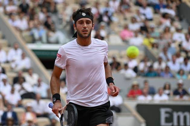 (230608) -- PARIS, June 8, 2023 -- Tomas Martin Etcheverry reacts during the men s singles quarterfinal match between Alexander Zverev of Germany and Tomas Martin Etcheverry of Argentina at the French Open tennis tournament at Roland Garros in Paris, France, on June 7, 2023. (Photo by Xinhua) (SP)FRANCE-PARIS-TENNIS-ROLAND GARROS-FRENCH OPEN-MEN S SINGLES JulienxMattia 