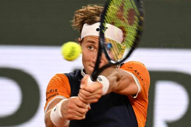 (230608) -- PARIS, June 8, 2023 -- Casper Ruud competes during the men s singles quarterfinal match between Casper Ruud of Norway and Holger Rune of Denmark at the French Open tennis tournament at Roland Garros in Paris, France, on June 7, 2023. (Photo by Xinhua) (SP)FRANCE-PARIS-TENNIS-ROLAND GARROS-FRENCH OPEN-MEN S SINGLES JulienxMattia 