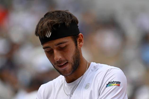 (230608) -- PARIS, June 8, 2023 -- Tomas Martin Etcheverry reacts during the men s singles quarterfinal match between Alexander Zverev of Germany and Tomas Martin Etcheverry of Argentina at the French Open tennis tournament at Roland Garros in Paris, France, on June 7, 2023. (Photo by Xinhua) (SP)FRANCE-PARIS-TENNIS-ROLAND GARROS-FRENCH OPEN-MEN S SINGLES JulienxMattia 