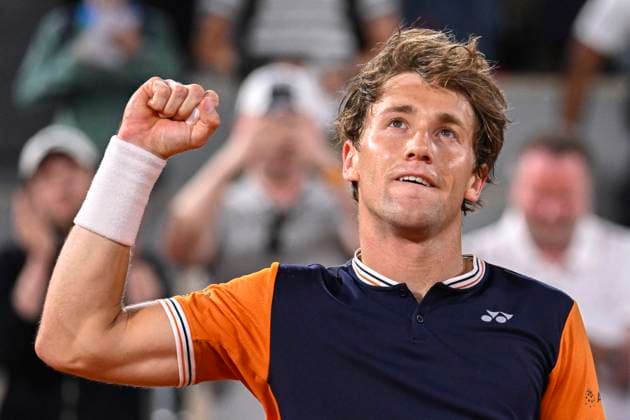 (230608) -- PARIS, June 8, 2023 -- Casper Ruud celebrates after winning the men s singles quarterfinal match between Casper Ruud of Norway and Holger Rune of Denmark at the French Open tennis tournament at Roland Garros in Paris, France, on June 7, 2023. (Photo by Xinhua) (SP)FRANCE-PARIS-TENNIS-ROLAND GARROS-FRENCH OPEN-MEN S SINGLES JulienxMattia 