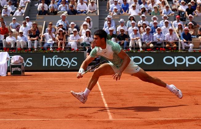 Mandatory Credit: Photo by Ella Ling Shutterstock (13949275v) Carlos Alcaraz of Spain in action French Open Tennis, Day 13, Roland Garros, Paris, France - 09 June 2023 French Open Tennis, Day 13, Roland Garros, Paris, France - 09 June 2023  Copyright: xEllaxLing Shutterstockx 13949275v