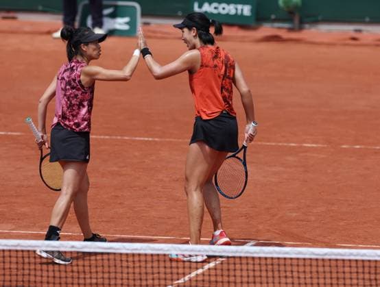 (230609) -- PARIS, June 9, 2023 -- Wang Xinyu (R) Hsieh Su-Wei celebrate during the women s doubles semifinals between Wang Xinyu of China Hsieh Su-Wei of Chinese Taipei and Nicole Melichar-Martinez of the United States Ellen Perez of Australia at the French Open tennis tournament at Roland Garros in Paris, France, June 9, 2023. ) (SP)FRANCE-PARIS-TENNIS-ROLAND GARROS-FRENCH OPEN-WOMEN S DOUBLES GaoxJing 
