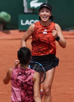 (230609) -- PARIS, June 9, 2023 -- Wang Xinyu (R) Hsieh Su-Wei celebrate after winning the women s doubles semifinals between Wang Xinyu of China Hsieh Su-Wei of Chinese Taipei and Nicole Melichar-Martinez of the United States Ellen Perez of Australia at the French Open tennis tournament at Roland Garros in Paris, France, June 9, 2023. ) (SP)FRANCE-PARIS-TENNIS-ROLAND GARROS-FRENCH OPEN-WOMEN S DOUBLES GaoxJing 