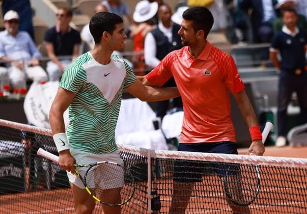 (230609) -- PARIS, June 9, 2023 -- Novak Djokovic (R) of Serbia greets Carlos Alcaraz of Spain prior to the men s singles semifinals between Novak Djokovic of Serbia and Carlos Alcaraz of Spain at the French Open tennis tournament at Roland Garros in Paris, France, June 9, 2023. ) (SP)FRANCE-PARIS-TENNIS-ROLAND GARROS-FRENCH OPEN-MEN S SINGLES GaoxJing 