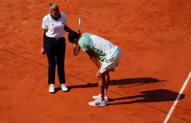 Mandatory Credit: Photo by Javier Garcia Shutterstock (13949278p) Carlos Alcaraz appears to suffer an injury early on the third set French Open Tennis, Day 13, Roland Garros, Paris, France - 09 June 2023 French Open Tennis, Day 13, Roland Garros, Paris, France - 09 June 2023  Copyright: xJavierxGarcia Shutterstockx 13949278p