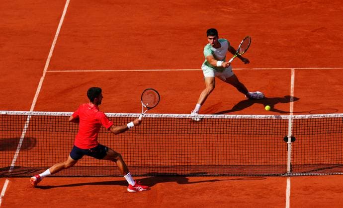 Mandatory Credit: Photo by Javier Garcia Shutterstock (13949278cx) Carlos Alcaraz takes on Novak Djokovic in the semi final French Open Tennis, Day 13, Roland Garros, Paris, France - 09 June 2023 French Open Tennis, Day 13, Roland Garros, Paris, France - 09 June 2023  Copyright: xJavierxGarcia Shutterstockx 13949278cx
