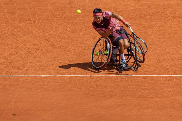 Men s Wheelchair Singles Final At Roland Garros - Day 14 Tokito Oda serves against Alfie Hewett on the final at Roland Garros Grand Slam Tournament - Day 14 on June 10, 2023 in Paris, France. Paris France  Copyright: xRobertxSzaniszlox originalFilename:szaniszlo-notitle230610_npTm2.jpg