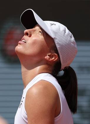 (230610) -- PARIS, June 10, 2023 -- Iga Swiatek of Poland reacts during the women s singles final against Karolina Muchova of the Czech Republic at the French Open tennis tournament at Roland Garros in Paris, France, June 10, 2023. ) (SP)FRANCE-PARIS-TENNIS-ROLAND GARROS-FRENCH OPEN-WOMEN S SINGLES-FINAL GaoxJing 