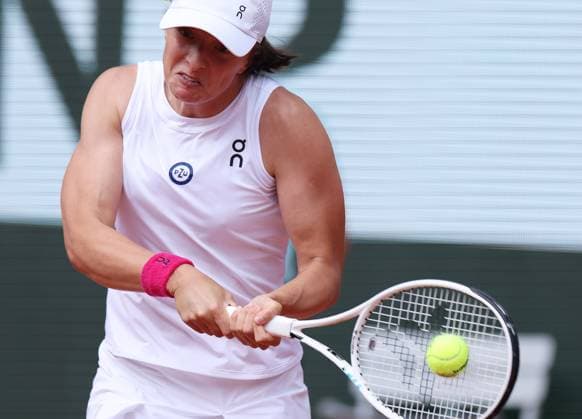 (230610) -- PARIS, June 10, 2023 -- Iga Swiatek of Poland hits a return during the women s singles final against Karolina Muchova of the Czech Republic at the French Open tennis tournament at Roland Garros in Paris, France, June 10, 2023. ) (SP)FRANCE-PARIS-TENNIS-ROLAND GARROS-FRENCH OPEN-WOMEN S SINGLES-FINAL GaoxJing 