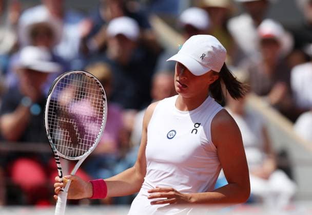 (230610) -- PARIS, June 10, 2023 -- Iga Swiatek of Poland reacts during the women s singles final against Karolina Muchova of the Czech Republic at the French Open tennis tournament at Roland Garros in Paris, France, June 10, 2023. ) (SP)FRANCE-PARIS-TENNIS-ROLAND GARROS-FRENCH OPEN-WOMEN S SINGLES-FINAL GaoxJing 