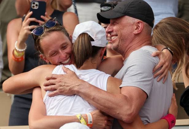 Top-seeded Iga Swiatek of Poland (L) hugs family members after winning her finals match against Karolina Muchova of the Czech Republic at the French Tennis Open in Paris, France, on Saturday, June 10, 2023. Swiatek won the open 6-2, 5-7, 6-4.  PAR20230610136 MAYAxVIDON-WHITE