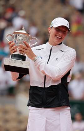 Top-seeded Iga Swiatek of Poland hold her trophy after winning her finals match against Karolina Muchova of the Czech Republic at the French Tennis Open in Paris, France, on Saturday, June 10, 2023. Swiatek won the open 6-2, 5-7, 6-4.  PAR20230610141 MAYAxVIDON-WHITE