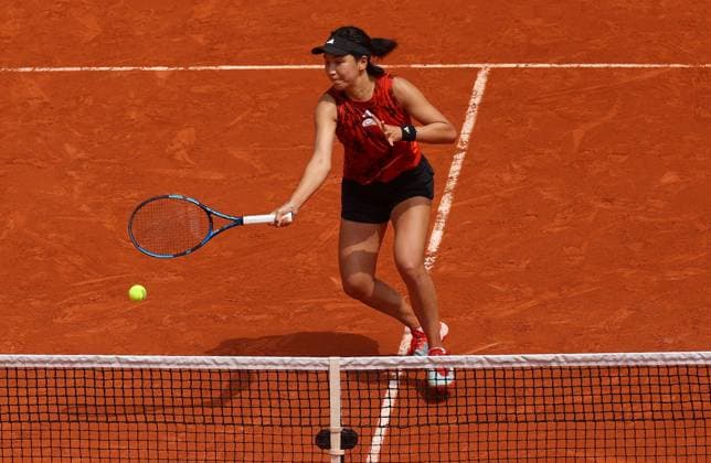 Mandatory Credit: Photo by Ella Ling Shutterstock (13949291q) Xinyu Wang of China in action French Open Tennis, Day 15, Roland Garros, Paris, France - 11 June 2023 French Open Tennis, Day 15, Roland Garros, Paris, France - 11 June 2023  Copyright: xEllaxLing Shutterstockx 13949291q