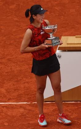 Mandatory Credit: Photo by Ella Ling Shutterstock (13949291b) Xinyu Wang of China celebrates with the trophy French Open Tennis, Day 15, Roland Garros, Paris, France - 11 June 2023 French Open Tennis, Day 15, Roland Garros, Paris, France - 11 June 2023  Copyright: xEllaxLing Shutterstockx 13949291b