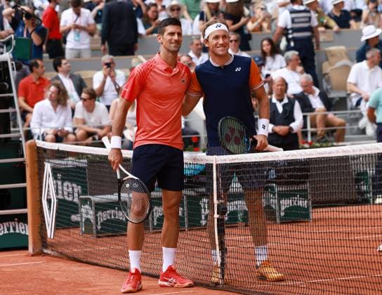 (230611) -- PARIS, June 11, 2023 -- Novak Djokovic (L) of Serbia and Casper Ruud of Norway pose for photos before their men s singles final at the French Open tennis tournament at Roland Garros in Paris, France, June 11, 2023. ) (SP)FRANCE-PARIS-TENNIS-ROLAND GARROS-FRENCH OPEN-MEN S SINGLES GaoxJing 