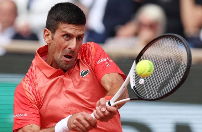 (230611) -- PARIS, June 11, 2023 -- Novak Djokovic of Serbia hits a return during the men s singles final against Casper Ruud of Norway at the French Open tennis tournament at Roland Garros in Paris, France, June 11, 2023. ) (SP)FRANCE-PARIS-TENNIS-ROLAND GARROS-FRENCH OPEN-MEN S SINGLES GaoxJing 