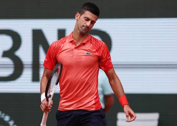 (230611) -- PARIS, June 11, 2023 -- Novak Djokovic of Serbia reacts during the men s singles final against Casper Ruud of Norway at the French Open tennis tournament at Roland Garros in Paris, France, June 11, 2023. ) (SP)FRANCE-PARIS-TENNIS-ROLAND GARROS-FRENCH OPEN-MEN S SINGLES GaoxJing 