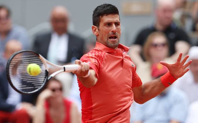 (230611) -- PARIS, June 11, 2023 -- Novak Djokovic of Serbia hits a return during the men s singles final against Casper Ruud of Norway at the French Open tennis tournament at Roland Garros in Paris, France, June 11, 2023. ) (SP)FRANCE-PARIS-TENNIS-ROLAND GARROS-FRENCH OPEN-MEN S SINGLES GaoxJing 