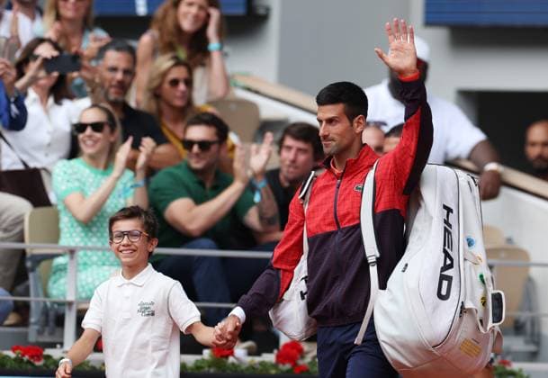 (230611) -- PARIS, June 11, 2023 -- Novak Djokovic (R) of Serbia enters the field of play before the men s singles final against Casper Ruud of Norway at the French Open tennis tournament at Roland Garros in Paris, France, June 11, 2023. ) (SP)FRANCE-PARIS-TENNIS-ROLAND GARROS-FRENCH OPEN-MEN S SINGLES GaoxJing 
