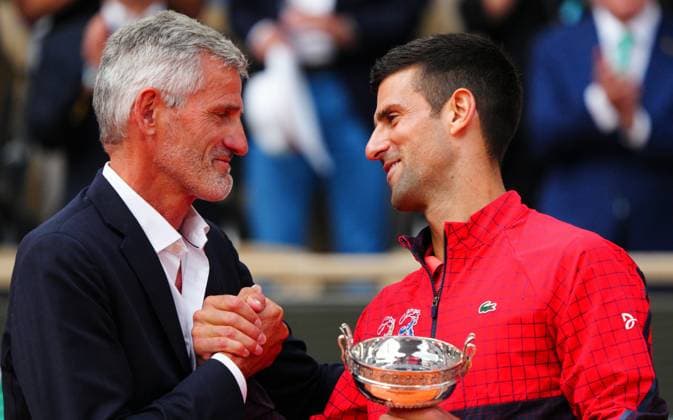 Mandatory Credit: Photo by Javier Garcia Shutterstock (13949284bs) French Tennis Federation President Gilles Morretton presents Novak Djokovic with a replica trophy detailing his 23 Grand Slam wins French Open Tennis, Day 15, Roland Garros, Paris, France - 11 June 2023 French Open Tennis, Day 15, Roland Garros, Paris, France - 11 June 2023  Copyright: xJavierxGarcia Shutterstockx 13949284bs