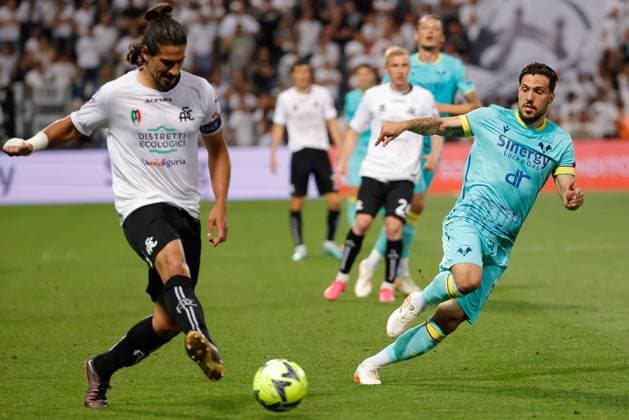 11th June 2023, Dacia Arena, Udine, Italy; Serie A Relegation Play Off Football; Spezia versus Hellas Verona; Dimitris Nikolaou of Spezia plays the ball away from Simone Verdi of Hellas Verona  ActionPlus12519185 EmanuelexPennacchio