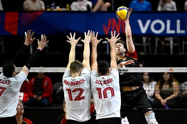 June 11, 2023, Ottawa, ON, CAN: Germany s Yan Bohme (31) spikes the ball as Canada s Lucas Van Berkel (12) and Ryan Joseph Sclater (10) defend, during Volleyball Nations League action in Ottawa, on Sunday, June 11, 2023. Yan Bohme Lucas Van Berkel Ryan Joseph Sclater  - ZUMAc35_ 20230611_zaf_c35_173 Copyright: xJustinxTangx