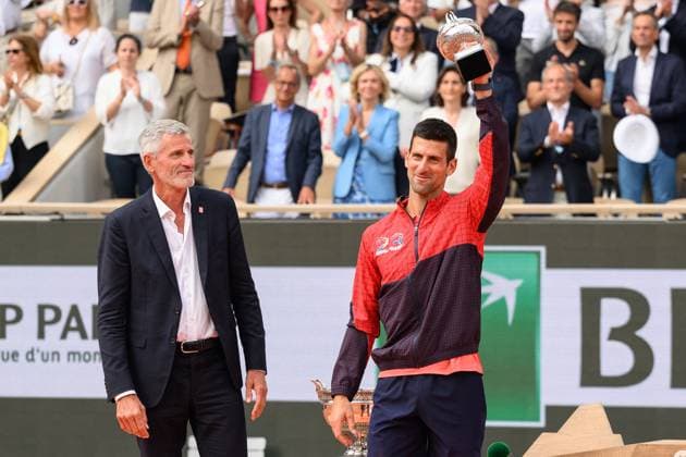 Novak Djokovic Wins Final Of French Open Gilles Moretton and Novak Djokovic of Serbia with the trophy after winning his men s singles final match against Casper Ruud during the French Open 2021 at Roland Garros on June 11, 2023 in Paris, France. Photo by Laurent Zabulon ABACAPRESS.COM Paris France  Copyright: xZabulonxLaurent ABACAx 856639_028 ZabulonxLaurent ABACAx 856639_028