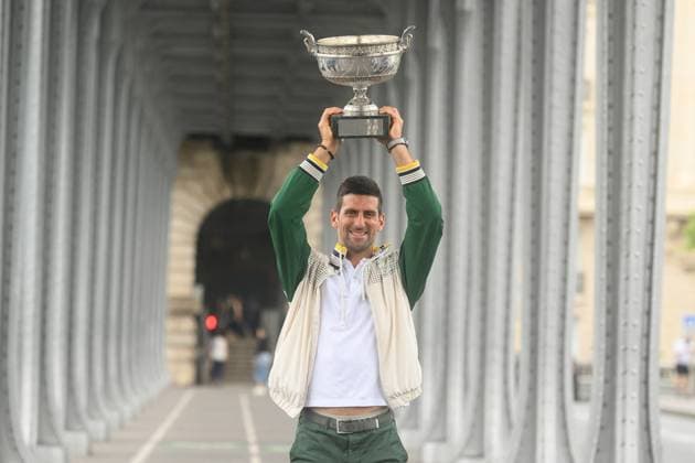 French Open - Novak Djokovic Poses With His Trophy Novak Djokovic of Serbia poses with The Musketeers? Cup after winning his 23rd grand slam trophy on the Bir-Hakeim bridge after winning the Men s Singles Title in the 2023 French Open on June 12, 2023 in Paris, France. Photo by Laurent Zabulon ABACAPRESS.COM attend the French Open 2021 at Roland Garros on June 11, 2023 in Paris, France. Photo by Laurent Zabulon ABACAPRESS.COM Paris France  Copyright: xZabulonxLaurent ABACAx 856704_021 ZabulonxLaurent ABACAx 0259523613st