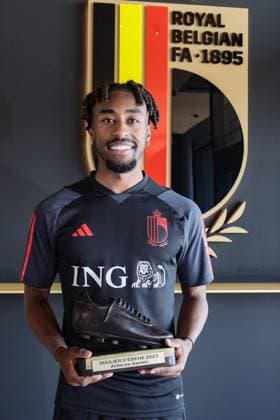 Belgium s Mike Tresor poses with his Ebony shoe trophy after a press conference, PK, Pressekonferenz of Belgian national soccer team Red Devils, Tuesday 13 June 2023, at the Royal Belgian Football Association RBFA s headquarters in Tubize, in preparation of the matches against Austria and Estonia later this month. BRUNOxFAHY  x68768505x