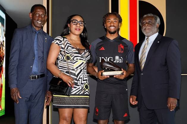 TUBEKE, BELGIUM - JUNE 13: Tresor Mike posing with his mother and The Ebony Shoe, a football trophy that is awarded annually in Belgium by the non-profit organization African Culture Promotion and Friendly Foot to the best player from Africa or of African descent in the Jupiler Pro League pictured after a training session of the Belgian National Football Team prior to the Euro 2024 qualification matches against Austria and Estonia at the RBFA Headquarters on June 13, 2023 in Tubeke, Belgium, 13 06 2023 ( media activities Belgian National Football Team 13 06 2023 PhotoNews Panoramic 