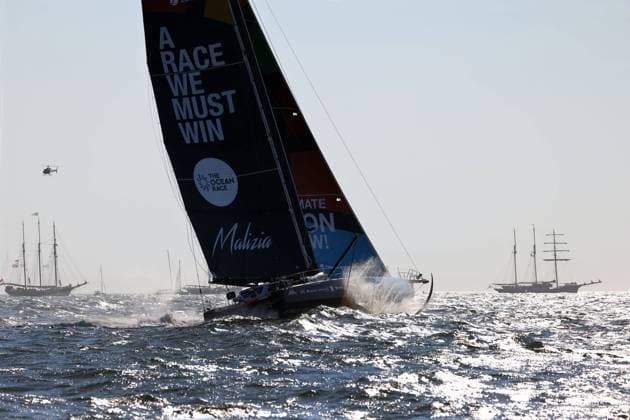 IMOCA by Seaexplorer Team Malizia around Boris Herrmann around glistening backlight during the Harbour Race, The Hague, The Ocean Race, Leg 7, Netherlands, 13 06 2023