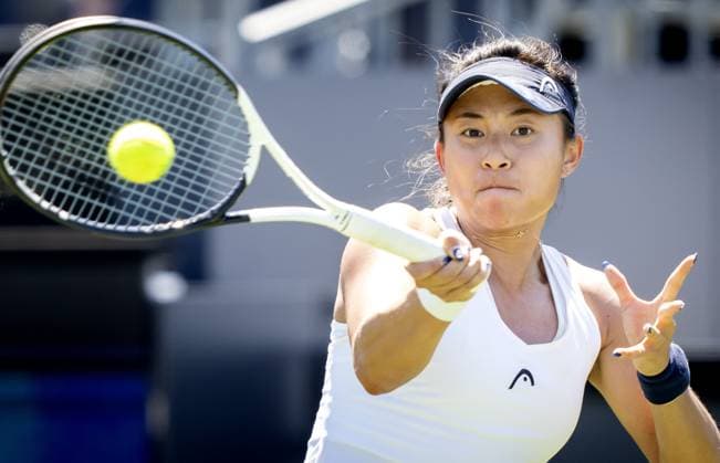ROSMALEN - Carol Zhao (CAN) in action against Veronika Kudermetova (RUS) on the third day of the Libema Open tennis tournament in Rosmalen. ANP SANDER KONING netherlands out - belgium out Rosmalen xVIxxIVx 471597538 originalFilename: 0259861912st.jpg