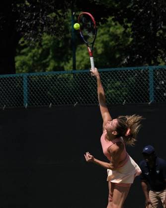 15th June 2023; Nottingham Tennis Centre, Nottingham, England: Rothesay Nottingham Open, Day 4; Camila Giorgi (ITA) serves to Elizabeth Mandlik (USA)  ActionPlus12519676 PaulxBonser
