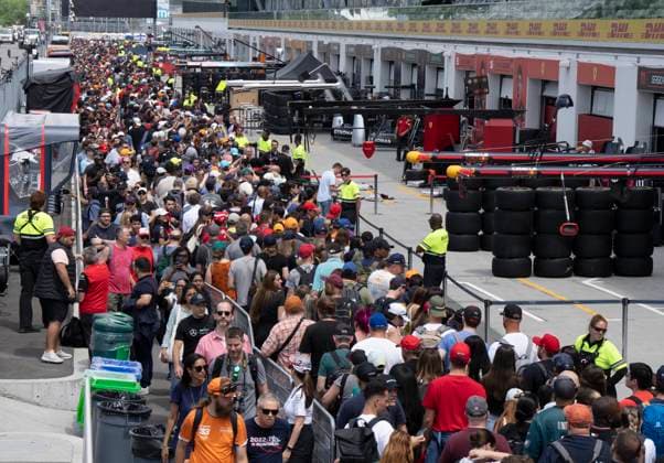 June 15, 2023, Montreal, PQ, Canada: Race fans walk through pit lane during the open house at the Canadian Grand Prix Thursday, June 15, 2023 in Montreal. Formula One is back in Canada for a second consecutive year as the Canadian Grand Prix gets underway this week in Montreal. Canada News - June 15, 2023  - ZUMAc35_ 20230615_zaf_c35_030 Copyright: xRyanxRemiorzx