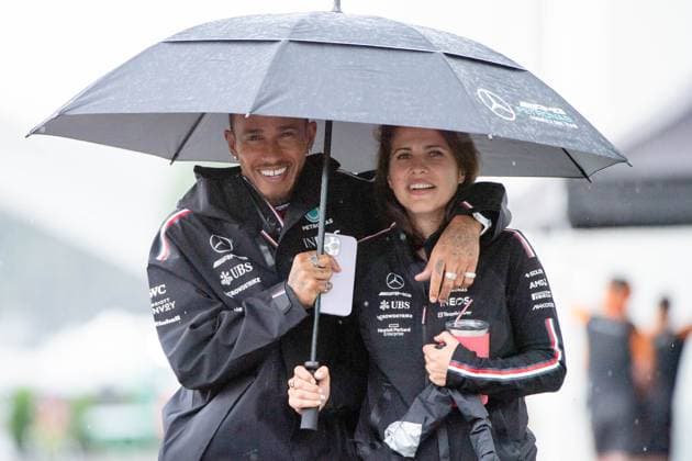 Lewis Hamilton UK, Mercedes AMG Petronas F1 Team, 44 under the umbrella with his press officer, CAN, Formula 1 World Championship, Canadian Grand Prix, Circuit de Gilles Villeneuve Montreal, Media Day, 15 06 2023 CAN, Formula 1 World Championship, Canadian Grand Prix, Circuit Gilles Villeneuve Montreal, Media Day, 15 06 2023 Montreal Copyright: xEibner Memmlerx EP_MMR