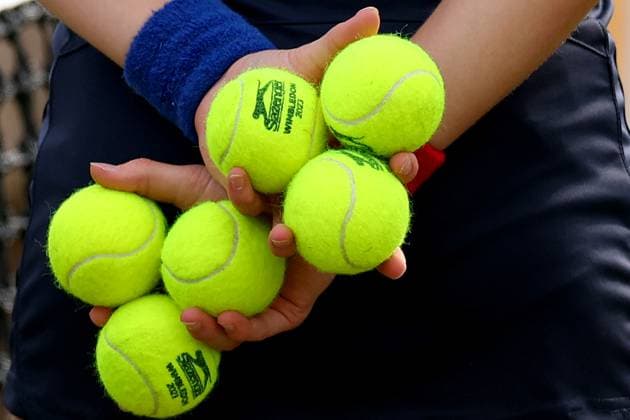 17th June 2023; Nottingham Tennis Centre, Nottingham, England: Rothesay Nottingham Open, Day 6; A ball girl holds Wimbledon 2023 tennis balls  ActionPlus12520623 ShaunxBrooks