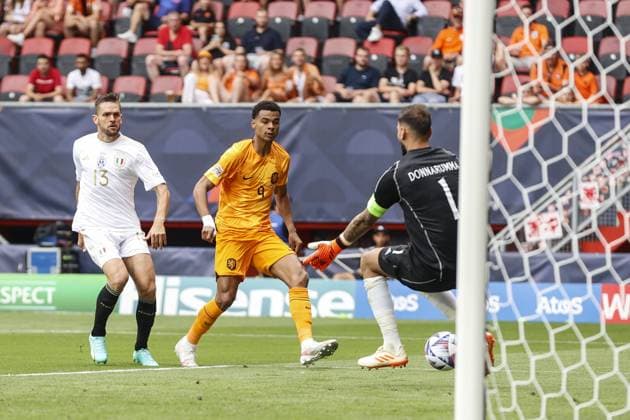 ENSCHEDE, 18-06-2023 , Stadium Grolsch Veste, Nations League 2022 2023 game for the 3rd and 4th place between Netherlands and Italy. (L-R) Italy player Rafael Toloi, Netherlands player Cody Gakpo, Italy goalkeeper Gianluigi Donnarumma Netherlands - Italy  x21374343x Copyright:
