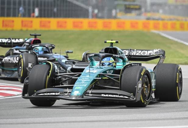 June 18, 2023, Montreal, PQ, Canada: Aston Martin driver Fernando Alonso of Spain, leads Mercedes driver George Russell of Great Britain, through the Senna corner during Formula One auto racing action at the Canadian Grand Prix in Montreal, Sunday, June 18, 2023. Fernando Alonso, George Russell - ZUMAc35_ 20230618_zaf_c35_039 Copyright: xGrahamxHughesx