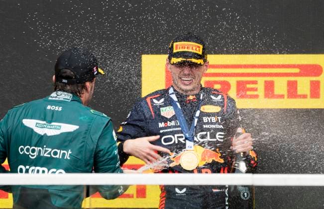 June 18, 2023, Montreal, PQ, Canada: Winner Red Bull Racing Max Verstappen of the Netherlands, is sprayed with champagne by second place finisher Aston Martin driver Fernando Alonso of Spain, during victory ceremonies following Formula One auto racing action at the Canadian Grand Prix in Montreal, Sunday, June 18, 2023. Max Verstappen Fernando Alonso  - ZUMAc35_ 20230618_zaf_c35_090 Copyright: xPaulxChiassonx