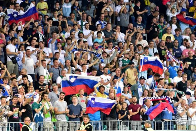 Slovenian fans celebrate score during the 2024 UEFA European Championship, EM, Europameisterschaft Qualifying football match between Slovenia and Denmark FOOTBALL : SlovÃ nie vs Danemark - Qualification Championnat d Europe UEFA 2024 - 19 06 2023 IgorKupljenik Panoramic  