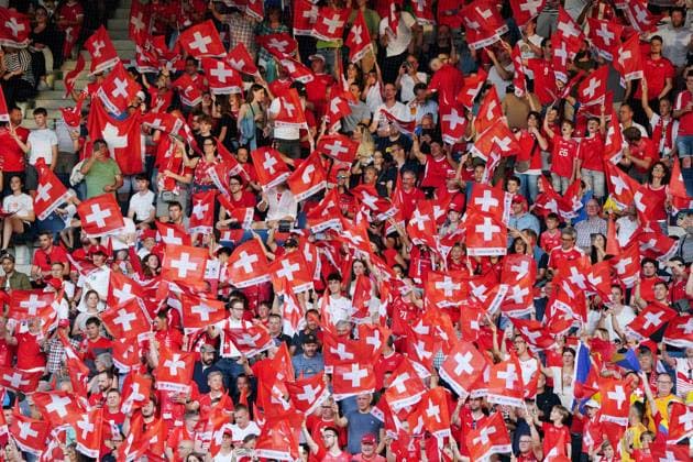 Photo Manuel Geisser 19 06 2023 Lucerne Switzerland Football European Championship Qualification Switzerland Romania picture Swiss fans with flags flags