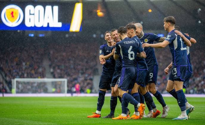 20th June 2023; Hampden Park, Glasgow, Scotland: Euro 2024 Qualifier Football, Scotland versus Georgia; Callum McGregor of Scotland celebrates with his team mates after he shoots and scores to make it 1-0 to Scotland in the 6th minute  ActionPlus12521776 VagelisxGeorgariou