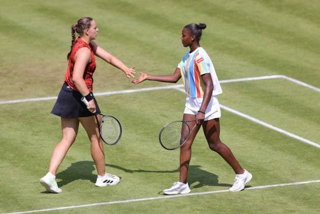 Jule Niemeier red and Noma Noha Akugue black , GER, during womens doubles at 2023 bett1 Open in Berlin, 21 06 2023