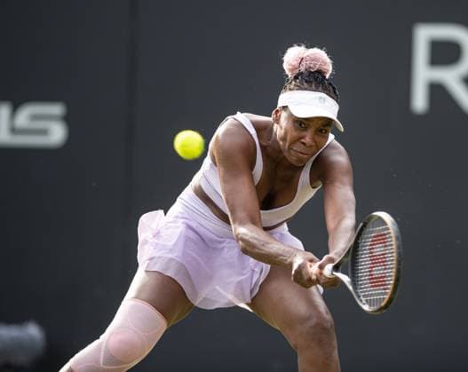 22nd June 2023; Edgbaston Priory Club, Birmingham, England: Rothesay Classic Birmingham, Day 4; Venus Williams (USA) just reaches a backhand against Jelena Ostapenko (LAT)  ActionPlus12522591 GodfreyxPitt