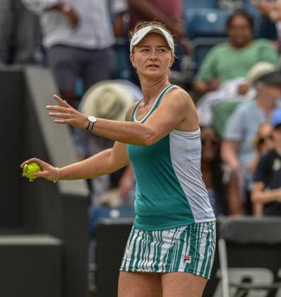 24th June 2023; Edgbaston Priory Club, Birmingham, England: Rothesay Classic Birmingham, Day 6; Womens doubles semi-final; Barbora Krejcikova (CZE) throws a ball into the crowd to celebrate wining the semi final match with her partner Marta Kostyuk (UKR) over Magda Linette (POL) and Bernarda Pera (USA)  ActionPlus12523475 GodfreyxPitt