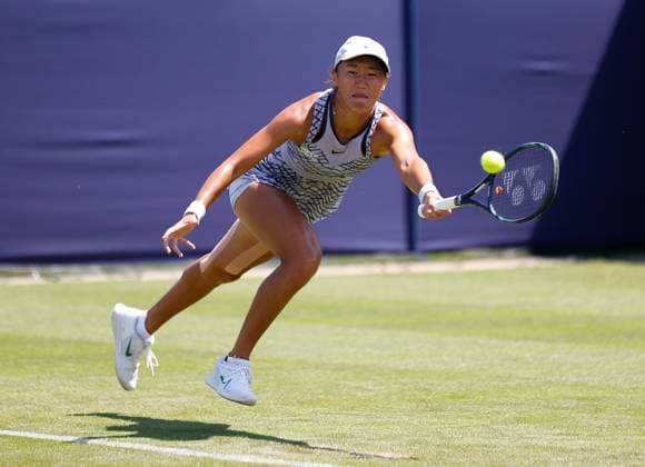 25th June 2023; Devonshire Park, Eastbourne, East Sussex, England: Rothesay International Eastbourne, Qualifying Round 2; Xiyu Wang (CHN) plays a forehand against Linda Fruhvirtova (CZE) in the Qualifying Round 2 Match  ActionPlus12523860 HongboxChen