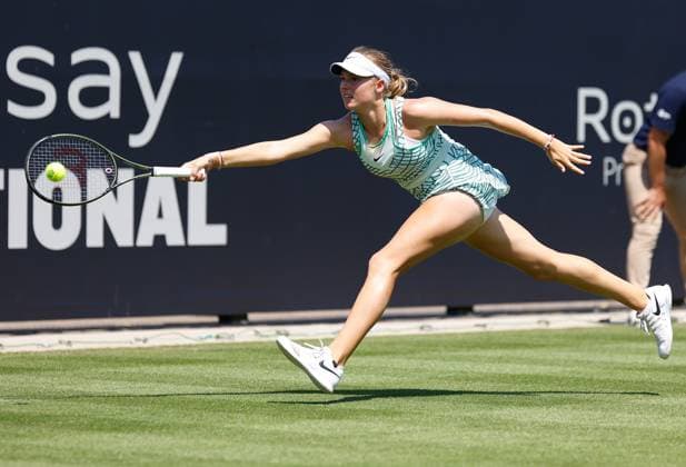 25th June 2023; Devonshire Park, Eastbourne, East Sussex, England: Rothesay International Eastbourne, Qualifying Round 2; Linda Fruhvirtova (CZE) plays a forehand against Xiyu Wang (CHN) in the Qualifying Round 2 Match  ActionPlus12523867 HongboxChen
