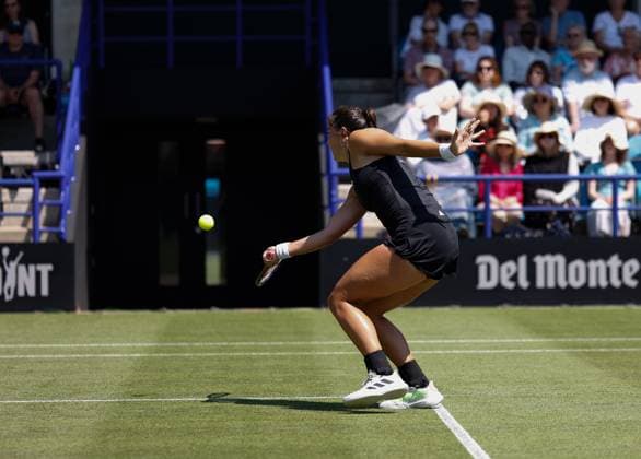 25th June 2023; Devonshire Park, Eastbourne, East Sussex, England: Rothesay International Eastbourne, Qualifying Round 2; Jodie Burrage (GBR) plays a forehand against Jasmine Paolini (ITA) in the Qualifying Round 2 match  ActionPlus12523878 HongboxChen