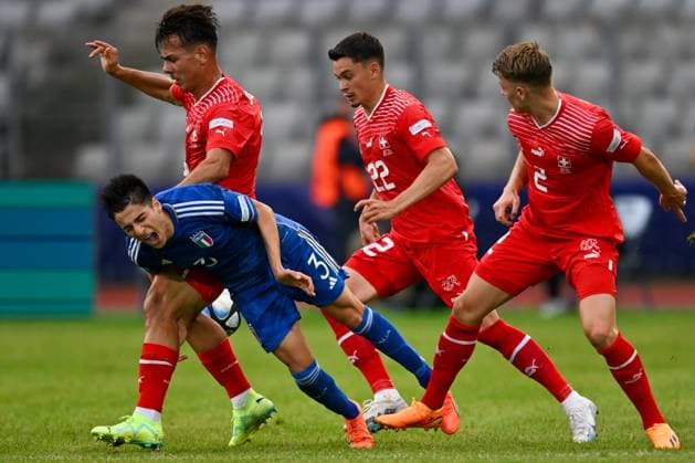 Foul play of Swiss U21, U 21 ¢& x80;& x99;s Lewin Blum on Italy U21Ã¢& x80;& x99;s Fabiano Parisi during the first qualifying round UEFA European Under-21 Championship 2023 soccer match Italy U21 vs. Swiss U21 at the Cluj Arena stadium in Cluj Napoca, Romania, 25nd of June 2023  Copyright: xVinnyxOrlando IPAxSportx xipa-agx xIPAxSportx 0 IPA_IPA38878075